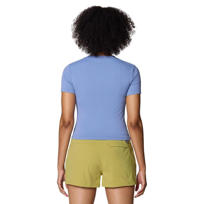 Woman from behind wearing a periwinkle blue ribbed short-sleeve Peak Knit Tee and olive green shorts.