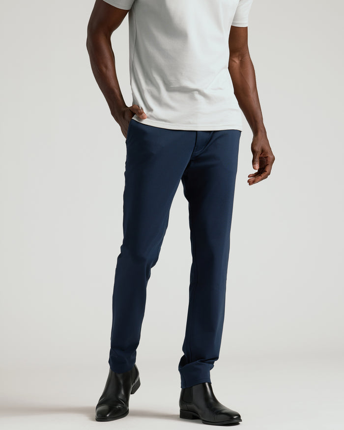 Navy Commuter Pants styled with black Chelsea boots.