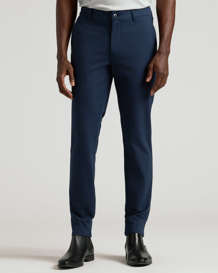 Navy Commuter Pants with black Chelsea boots.