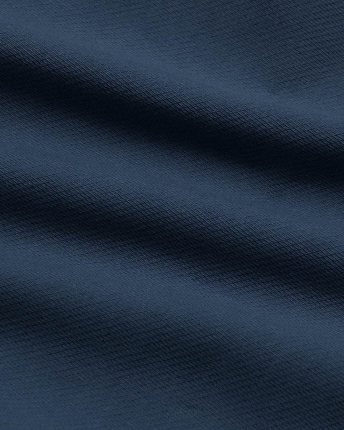 Navy Slim Chino Pants fabric with fine knit texture.