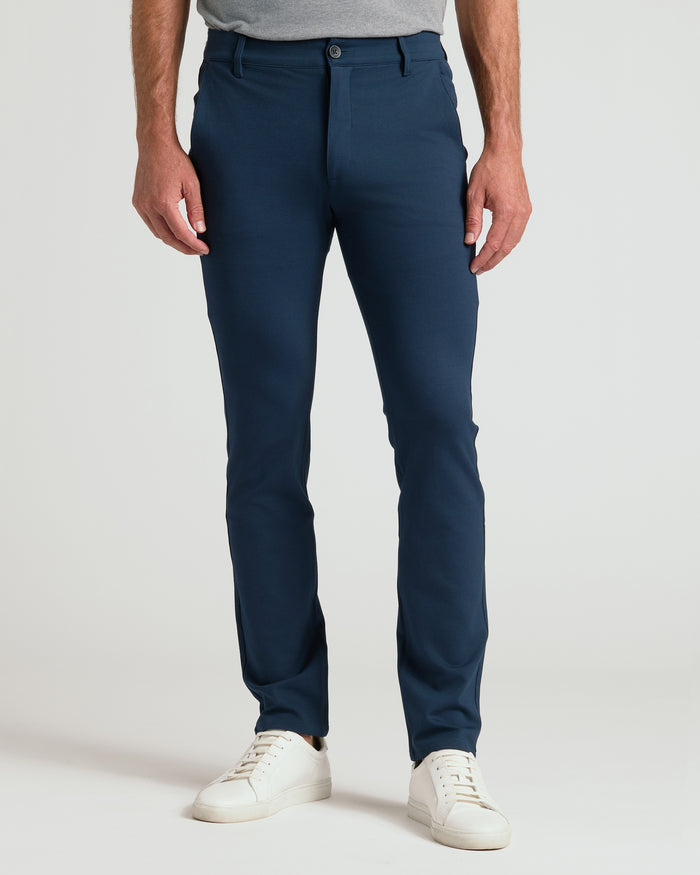 Navy Slim Comfort Knit Chino Pant worn with grey T-shirt.