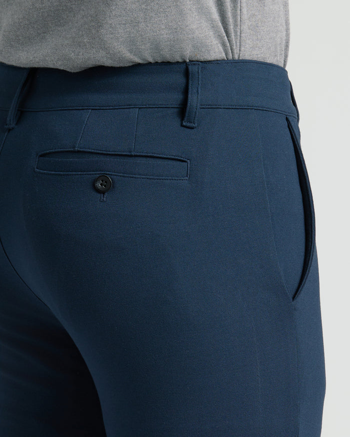 Navy Slim Comfort Knit Chino Pant with welted back pocket and belt loops.