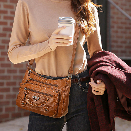Quixelle - Sac bandoulière femme en cuir PU souple avec multiples poches
