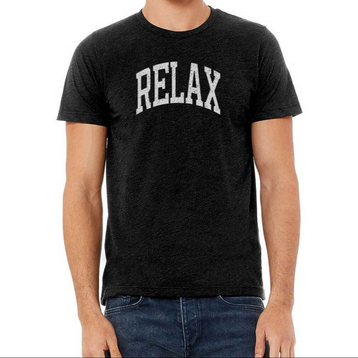 Man wearing a black soft cotton t-shirt with the word RELAX printed on the front in collegiate style, showcasing the RELAX Collegiate Unisex T-Shirt | Lucky Owl.