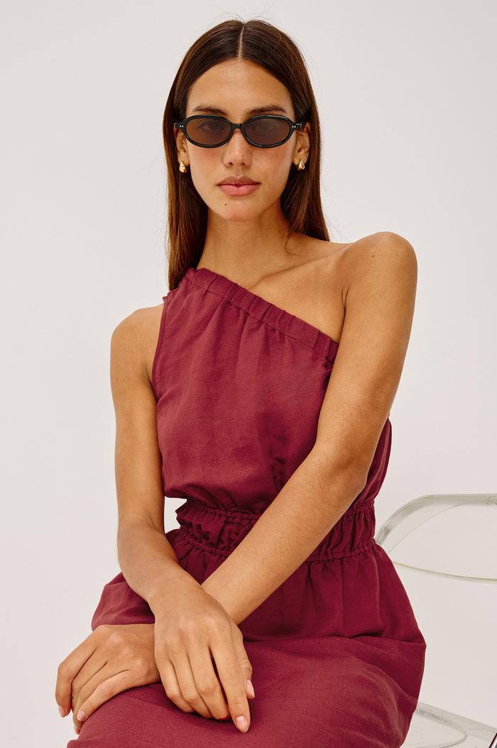 Selani Midi Dress in Linen-Viscose Blend With One-Shoulder Neckline, Laddered Elastic Waist, Side Slits, Side Pockets, and Softly Voluminous Skirt in Spice Colorway - Upper Body Front View Featured on Model