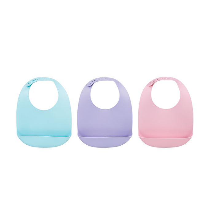 Three Silicone Feeding Bibs (3 Pack) in Aqua, Purple, and Pink are displayed side by side, each featuring an adjustable neck strap and a crumb catcher pocket at the bottom to catch food.