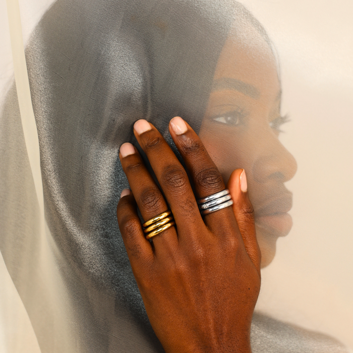 Silver All Weather Rings (Set of 3) showcased on a hand with diverse rings against a soft background.
