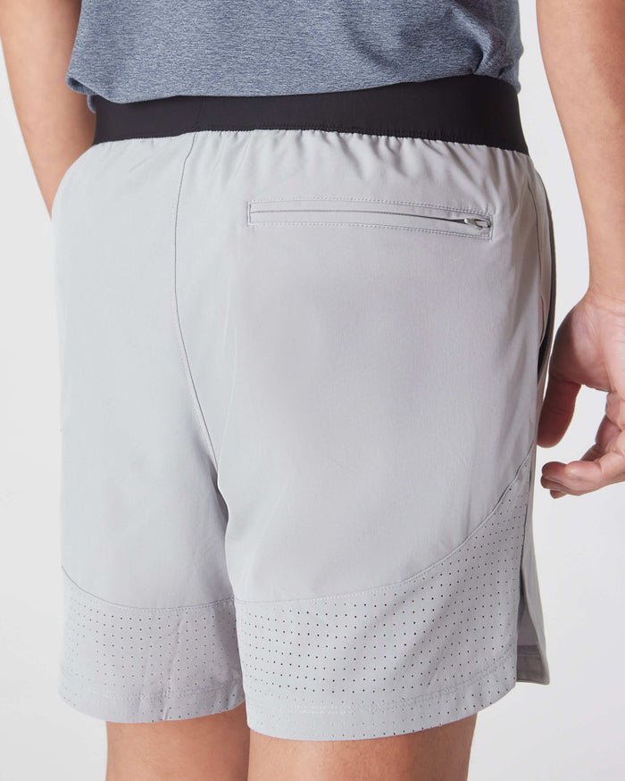 Steel 7 Active Training Short with black waistband, zippered pocket, ventilated hem.