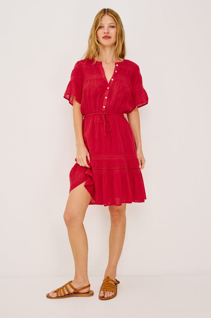 Winslow Mini Dress in Luxe Linen With Loose Fit, Lace Insets, Partial Button Front, Adjustable Drawstring Waist Ties, and a Fully Lined Skirt in Tomato Colorway - Full Body Front View Featured on Model
