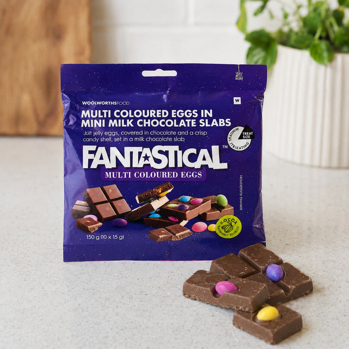 Woolworths Fantastical 150g mini chocolate slabs with colourful eggs on a kitchen counter
